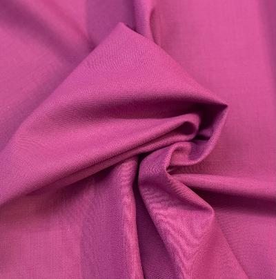 This deep purple berry hue will have you looking rich and majestic in this lovely Italian Textured Wool Crepe. This wool crepe is 100% wool and has a fine texture on both sides. This crepe prioritizes structure over drape and has a little salvage to salvage stretchiness. With its beautiful texture and flattering fit this wool crepe would be great for skirts, dresses, pants, jackets & more.