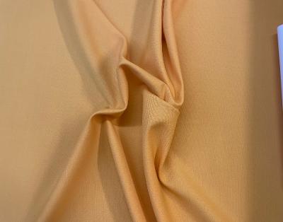 Feel happy and inspired in this warm spectra yellow Italian Fine Textured Wool Crepe. This wool crepe is 100% wool and has a fine texture on both sides. This crepe prioritizes structure over drape and has a little salvage to salvage stretchiness. With its beautiful texture and flattering fit this wool crepe would be great for skirts, dresses, pants, jackets & more.