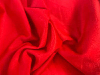 This bright red Italian Designer Fused Cashmere Wool is the ultimate luxury winter fabric to bring you luck and good fortune! For more structure, this Cashmere wool is all-over fused on the wrong side. Lavish yourself in skirts, dresses, coats, and jackets made from this beautiful cashmere wool from Italy.